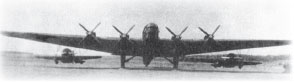 Бомбардировщик ТБ-3 с двумя истребителями И-16